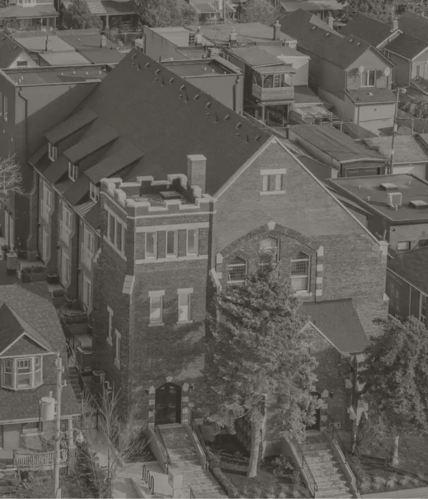 Partial image of Hallam Towns with a dark overlay